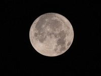 Close up of  the Full Moon of July 2024 known as Buck Moon or Thunder Moon spotted over Mount Olympus in Greece. Mount Olympus is a National...