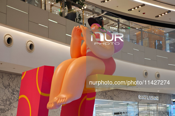 A shopping mall is turning its atrium into a cartoon arena to host a series of events for the upcoming Paris Olympic Games in Shanghai, Chin...