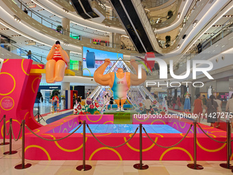 A shopping mall is turning its atrium into a cartoon arena to host a series of events for the upcoming Paris Olympic Games in Shanghai, Chin...