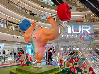 A shopping mall is turning its atrium into a cartoon arena to host a series of events for the upcoming Paris Olympic Games in Shanghai, Chin...