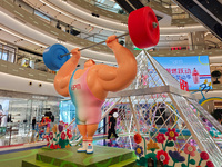 A shopping mall is turning its atrium into a cartoon arena to host a series of events for the upcoming Paris Olympic Games in Shanghai, Chin...