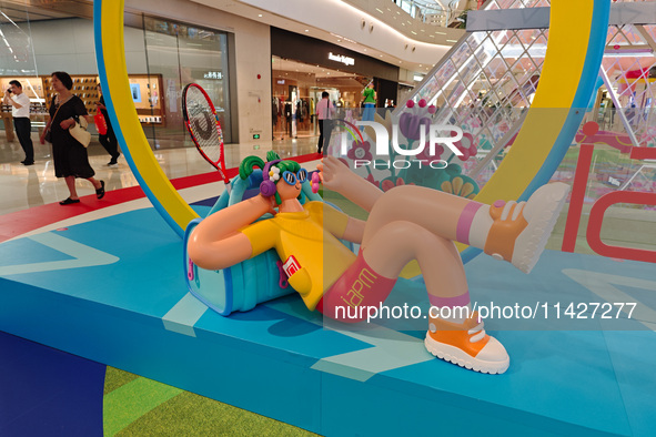 A shopping mall is turning its atrium into a cartoon arena to host a series of events for the upcoming Paris Olympic Games in Shanghai, Chin...