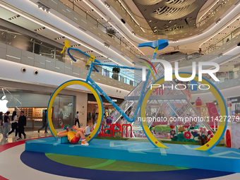 A shopping mall is turning its atrium into a cartoon arena to host a series of events for the upcoming Paris Olympic Games in Shanghai, Chin...