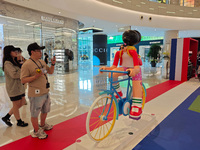 A shopping mall is turning its atrium into a cartoon arena to host a series of events for the upcoming Paris Olympic Games in Shanghai, Chin...