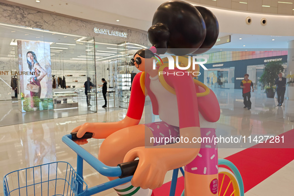 A shopping mall is turning its atrium into a cartoon arena to host a series of events for the upcoming Paris Olympic Games in Shanghai, Chin...