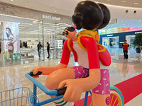 A shopping mall is turning its atrium into a cartoon arena to host a series of events for the upcoming Paris Olympic Games in Shanghai, Chin...