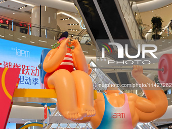 A shopping mall is turning its atrium into a cartoon arena to host a series of events for the upcoming Paris Olympic Games in Shanghai, Chin...