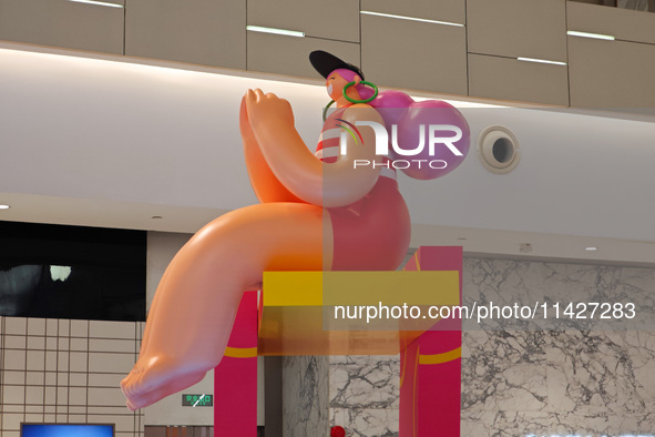 A shopping mall is turning its atrium into a cartoon arena to host a series of events for the upcoming Paris Olympic Games in Shanghai, Chin...