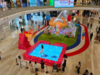 A shopping mall is turning its atrium into a cartoon arena to host a series of events for the upcoming Paris Olympic Games in Shanghai, Chin...