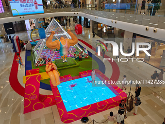 A shopping mall is turning its atrium into a cartoon arena to host a series of events for the upcoming Paris Olympic Games in Shanghai, Chin...