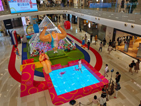 A shopping mall is turning its atrium into a cartoon arena to host a series of events for the upcoming Paris Olympic Games in Shanghai, Chin...