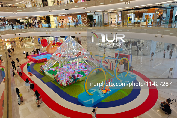 A shopping mall is turning its atrium into a cartoon arena to host a series of events for the upcoming Paris Olympic Games in Shanghai, Chin...