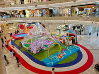 A shopping mall is turning its atrium into a cartoon arena to host a series of events for the upcoming Paris Olympic Games in Shanghai, Chin...