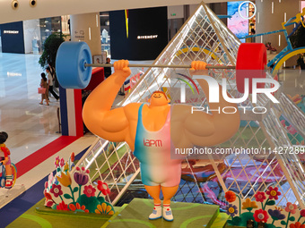 A shopping mall is turning its atrium into a cartoon arena to host a series of events for the upcoming Paris Olympic Games in Shanghai, Chin...