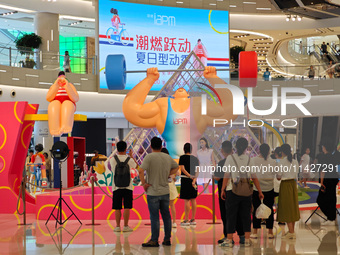 A shopping mall is turning its atrium into a cartoon arena to host a series of events for the upcoming Paris Olympic Games in Shanghai, Chin...