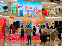 A shopping mall is turning its atrium into a cartoon arena to host a series of events for the upcoming Paris Olympic Games in Shanghai, Chin...