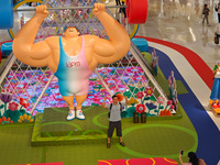 A shopping mall is turning its atrium into a cartoon arena to host a series of events for the upcoming Paris Olympic Games in Shanghai, Chin...