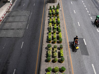 Motorcycles are driving on Sukhumvit Road in Bangkok, Thailand, on July 22, 2024 (