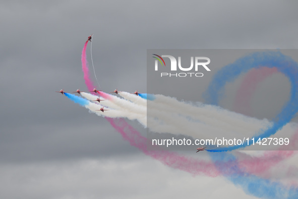 The Royal Air Force Red Arrows are performing during the Royal International Air Tattoo at RAF Fairford in Gloucestershire, England, on July...