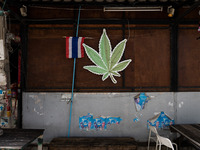 A large marijuana leaf is being displayed on the outside of a neighborhood cannabis dispensary in Bangkok, Thailand, on July 22, 2024 (