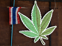 A large marijuana leaf is being displayed on the outside of a neighborhood cannabis dispensary in Bangkok, Thailand, on July 22, 2024 (