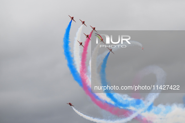 The Royal Air Force Red Arrows are performing during the Royal International Air Tattoo at RAF Fairford in Gloucestershire, England, on July...