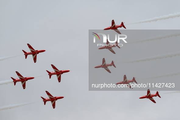 The Royal Air Force Red Arrows are performing during the Royal International Air Tattoo at RAF Fairford in Gloucestershire, England, on July...