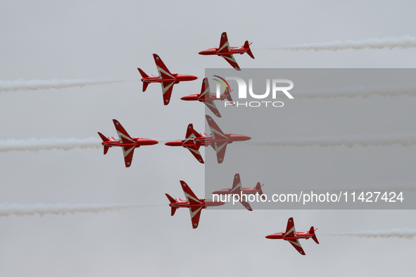 The Royal Air Force Red Arrows are performing during the Royal International Air Tattoo at RAF Fairford in Gloucestershire, England, on July...