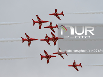 The Royal Air Force Red Arrows are performing during the Royal International Air Tattoo at RAF Fairford in Gloucestershire, England, on July...