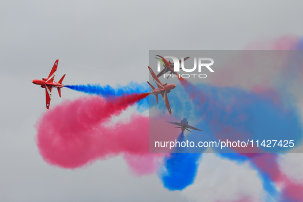 The Royal Air Force Red Arrows are performing during the Royal International Air Tattoo at RAF Fairford in Gloucestershire, England, on July...