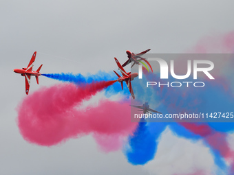 The Royal Air Force Red Arrows are performing during the Royal International Air Tattoo at RAF Fairford in Gloucestershire, England, on July...