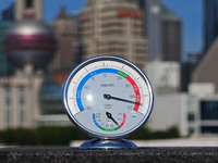 A thermometer is showing the outdoor temperature above 45?C on the Bund view terrace in Shanghai, China, on July 22, 2024. (