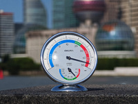 A thermometer is showing the outdoor temperature above 45?C on the Bund view terrace in Shanghai, China, on July 22, 2024. (