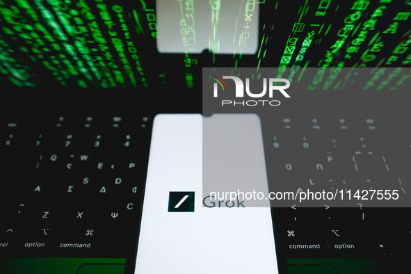 The Grok logo is being displayed on a smartphone screen in Athens, Greece, on July 22, 2024. (Photo Illustration by Nikolas Kokovlis/NurPhot...