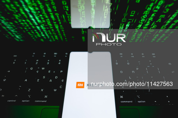 The Xiaomi logo is being displayed on a smartphone screen in Athens, Greece, on July 22, 2024. (Photo Illustration by Nikolas Kokovlis/NurPh...