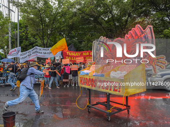 Demonstrators are carrying banners and placards and are gathering in the streets of Quezon City, Philippines, on July 22, 2024. Protestors a...