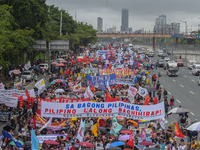 Demonstrators are carrying banners and placards and are gathering in the streets of Quezon City, Philippines, on July 22, 2024. Protestors a...