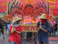 Demonstrators are carrying banners and placards and are gathering in the streets of Quezon City, Philippines, on July 22, 2024. Protestors a...