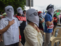 Demonstrators are carrying banners and placards and are gathering in the streets of Quezon City, Philippines, on July 22, 2024. Protestors a...