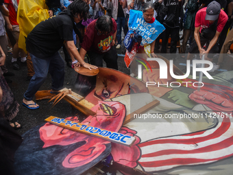 Demonstrators are carrying banners and placards and are gathering in the streets of Quezon City, Philippines, on July 22, 2024. Protestors a...