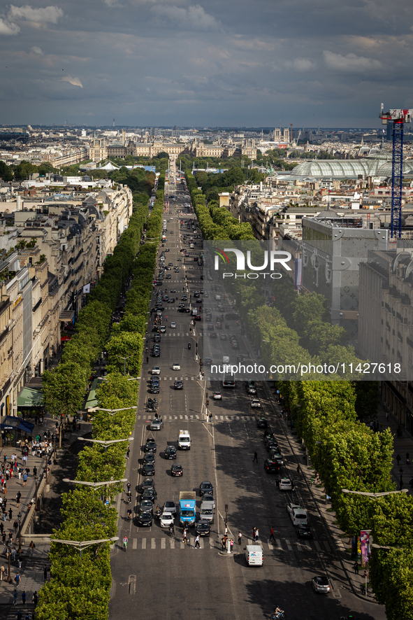 View of Champs-Elysees Avenue from the Arc de Triomphe terrace in Paris, France, on July 12, 2024. 