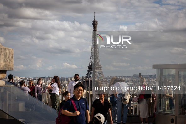 View of the Eiffel Tower from the Arc de Triomph terrace in Paris, France, on July 12, 2024. 