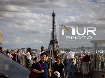 View of the Eiffel Tower from the Arc de Triomph terrace in Paris, France, on July 12, 2024. (