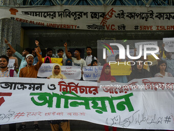 Students from Aliah University are holding posters as they are taking part in a demonstration in Kolkata, India, on July 22, 2024, demanding...