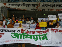 Students from Aliah University are holding posters as they are taking part in a demonstration in Kolkata, India, on July 22, 2024, demanding...