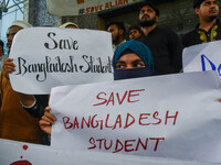 Students from Aliah University are holding posters as they are taking part in a demonstration in Kolkata, India, on July 22, 2024, demanding...