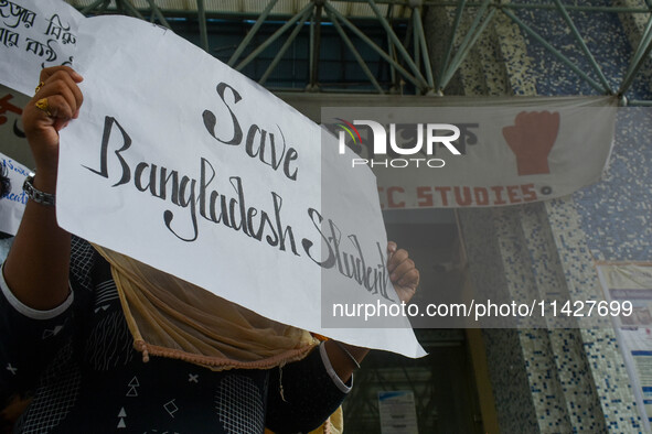 Students from Aliah University are holding posters as they are taking part in a demonstration in Kolkata, India, on July 22, 2024, demanding...