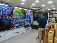 Customers are shopping at an electronic store in Kolkata, India, on July 22, 2024. The budget is boosting the ''Make in India'' campaign by...