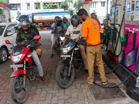 A crowd is gathering at a petrol filling station in Kolkata, India, on July 22, 2024. People are expecting some relief from the budget again...