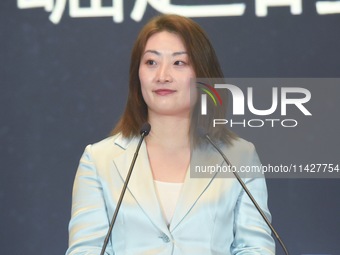 Kelly (Fuli Zong) is delivering a speech while attending a forum event in Hangzhou, China, on November 24, 2020. (